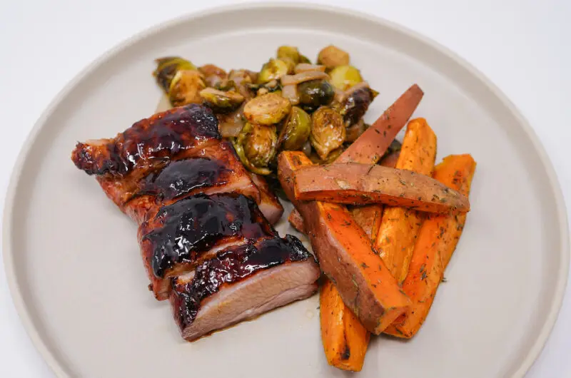 Balsamic Glazed Pork Belly, Caramelized Brussels Sprouts, & Herb-Roasted Sweet Potato Wedges 